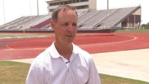 Sam Harrell at a football field