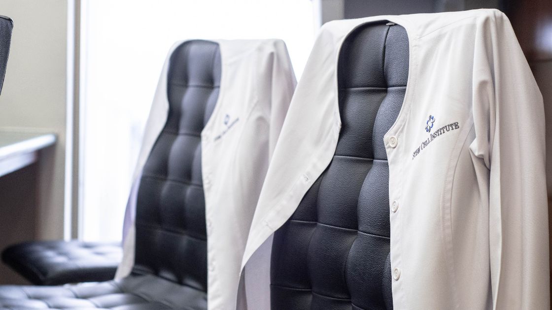 Stem Cell Institute doctor white coats on chairs