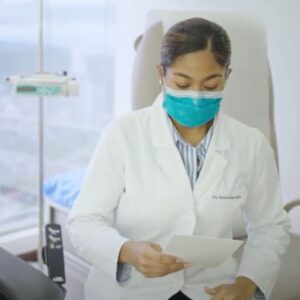 Stem Cell Institute doctor looking at paperwork