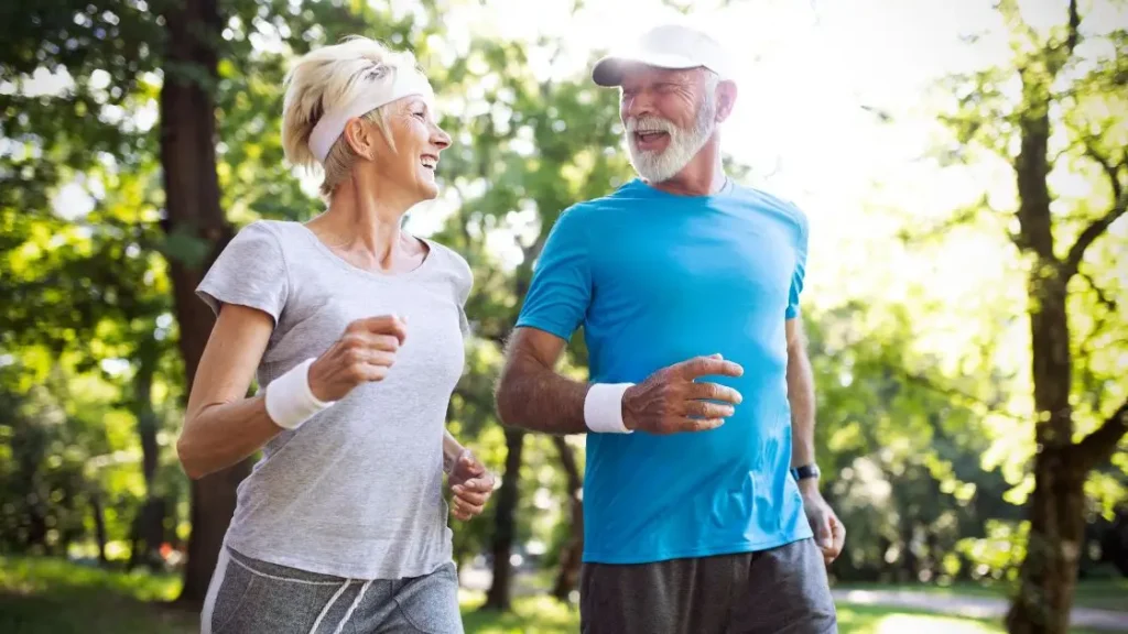 Happy and healthy couple running together