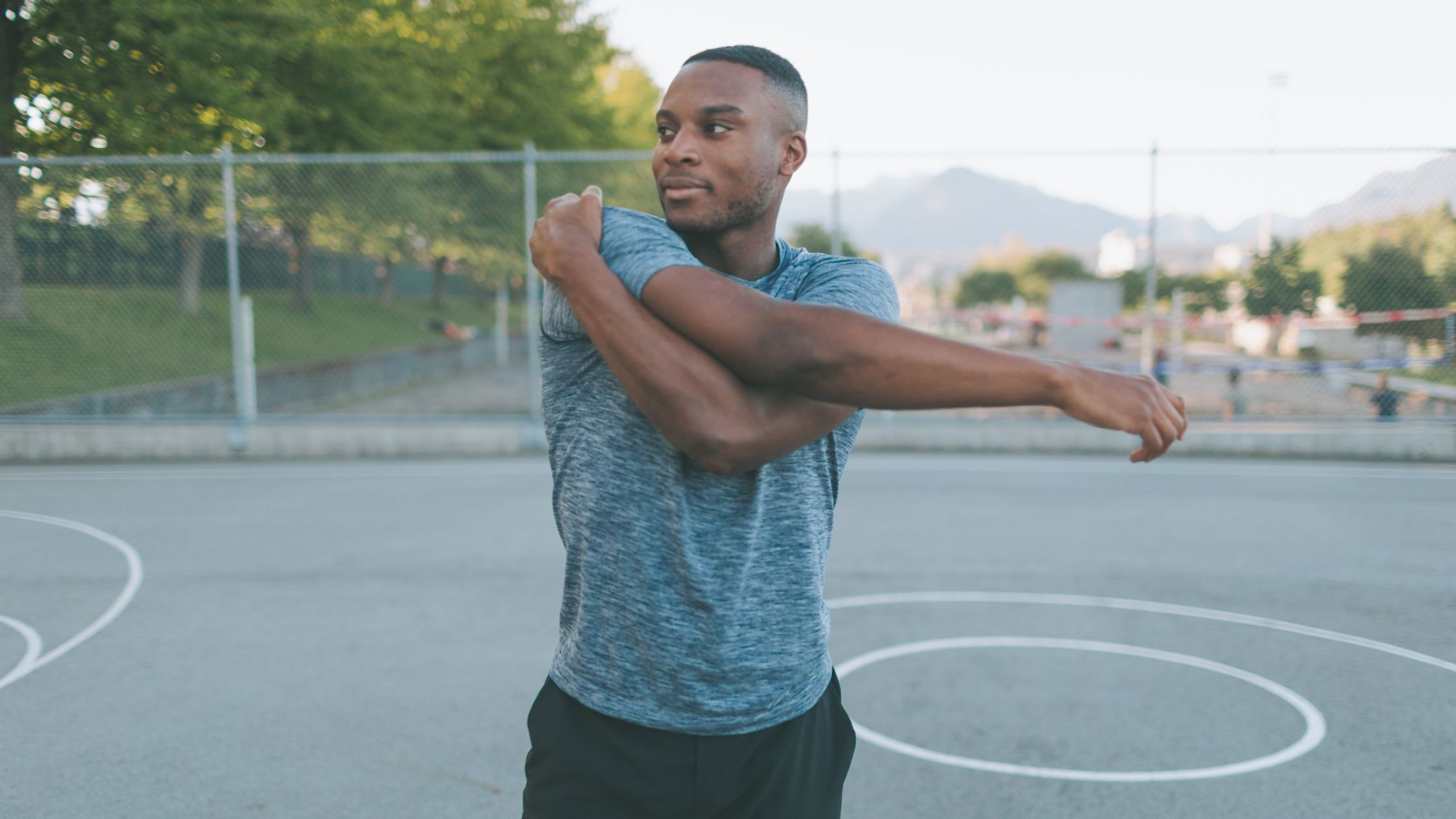 Athlete stretching outside