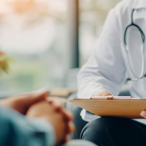 doctor and patient discussing personalized stem cell therapy during a consultation